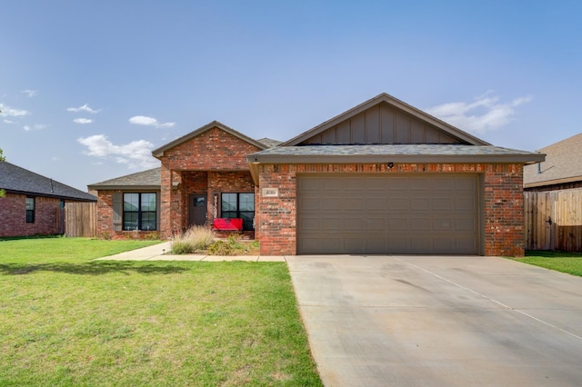 single story home featuring a garage and a front yard