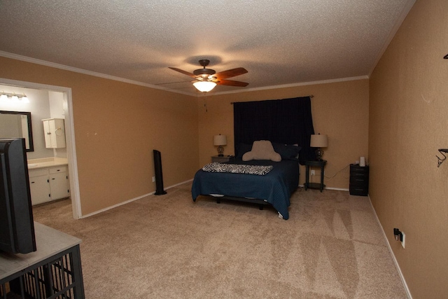 bedroom with ceiling fan, ensuite bath, crown molding, and light carpet