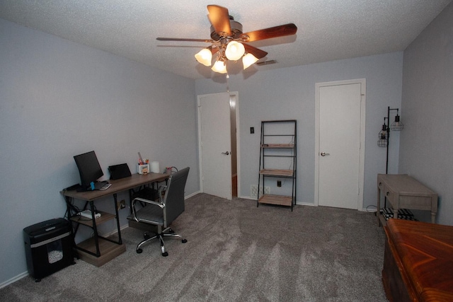 office space with ceiling fan, a textured ceiling, and carpet flooring