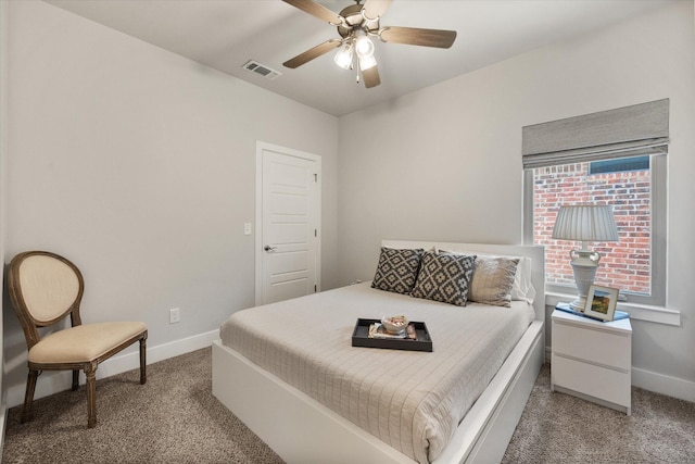 bedroom featuring baseboards, visible vents, and carpet floors