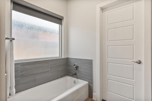 bathroom featuring a bath