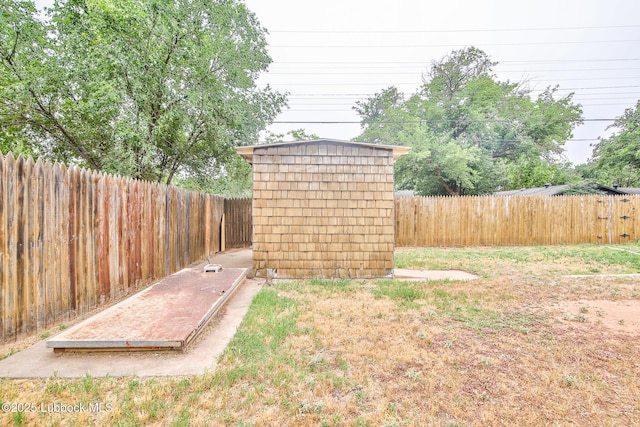 4815 15th St, Lubbock, TX 79416 - fenced backyard with a storage unit