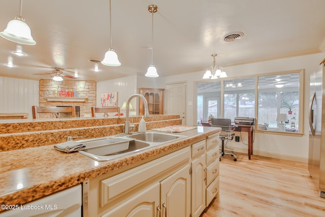 4815 15th St, Lubbock, TX 79416 - kitchen featuring ceiling fan, white dishwasher, ornamental molding, decorative light fixtures, and a chandelier