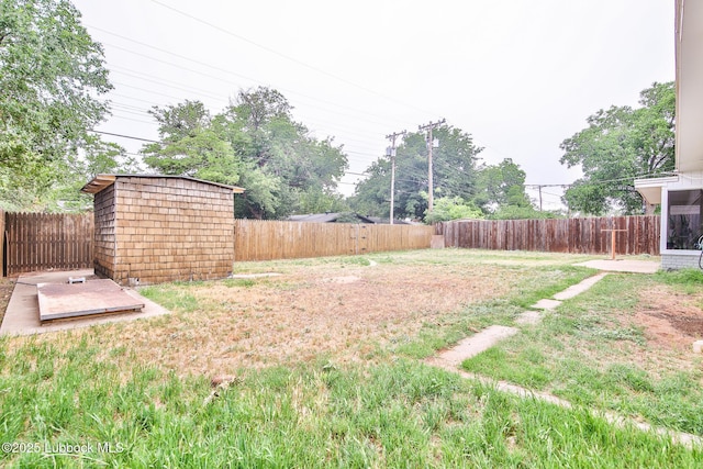 4815 15th St, Lubbock, TX 79416 - fenced backyard featuring a storage unit
