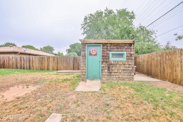 4815 15th St, Lubbock, TX 79416 - view of shed with a fenced backyard