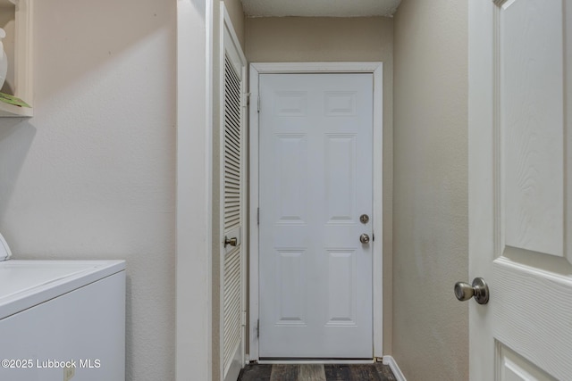 8609 Kenosha Dr, Lubbock, TX 79423 - laundry area with dark wood finished floors and baseboards