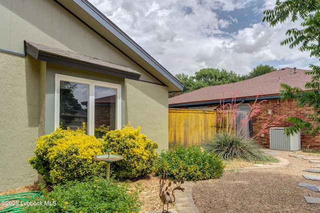 8609 Kenosha Dr, Lubbock, TX 79423 - view of home's exterior with stucco siding