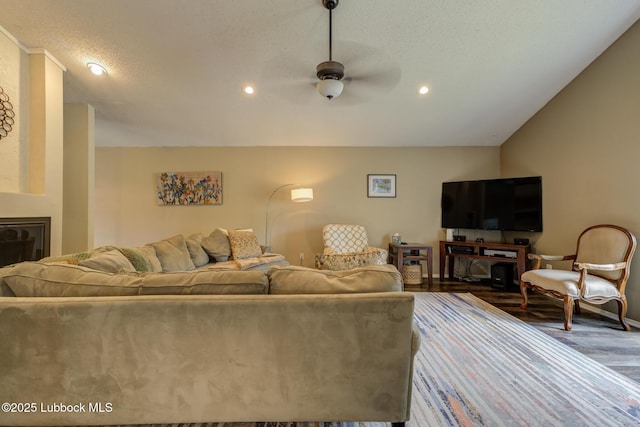 8609 Kenosha Dr, Lubbock, TX 79423 - living area with ceiling fan, wood finished floors, recessed lighting, baseboards, and a textured ceiling