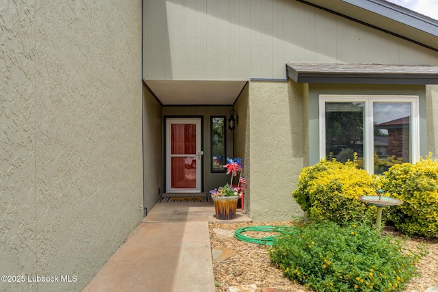 8609 Kenosha Dr, Lubbock, TX 79423 - view of exterior entry with stucco siding