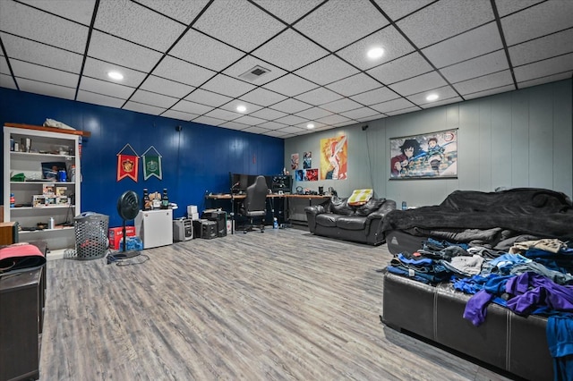 rec room featuring hardwood / wood-style flooring and a paneled ceiling