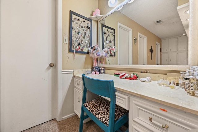 bathroom with a textured ceiling