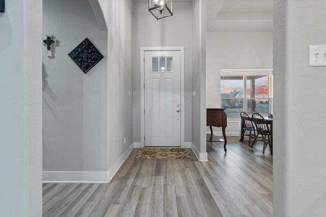 entryway with light hardwood / wood-style floors