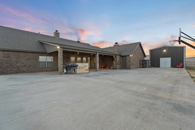 exterior space with a shed