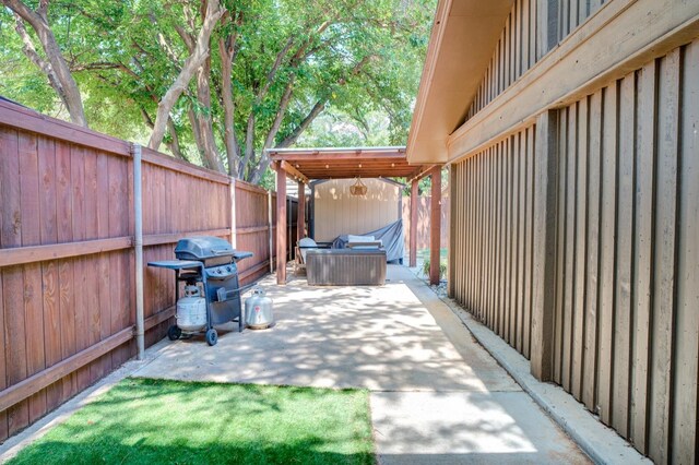 view of patio featuring area for grilling and an outdoor hangout area