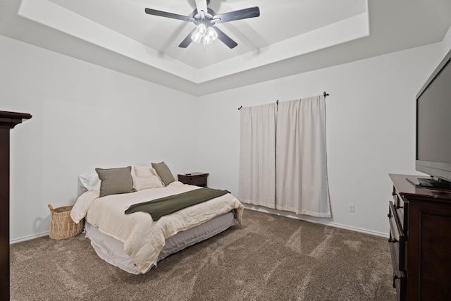 3615 121st St, Lubbock, TX 79423 - carpeted bedroom with a tray ceiling and ceiling fan