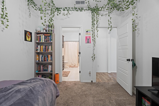3615 121st St, Lubbock, TX 79423 - bedroom with carpet floors and ensuite bathroom