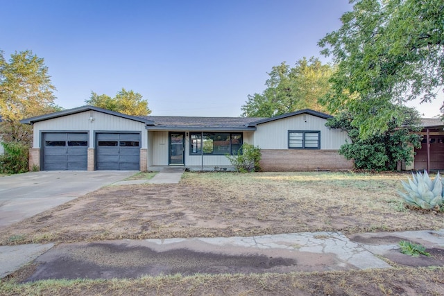 single story home with a garage