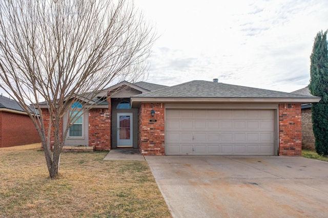 ranch-style home with a garage and a front yard