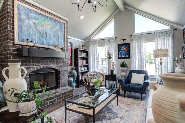 living room featuring vaulted ceiling with beams, a fireplace, hardwood / wood-style floors, and plenty of natural light