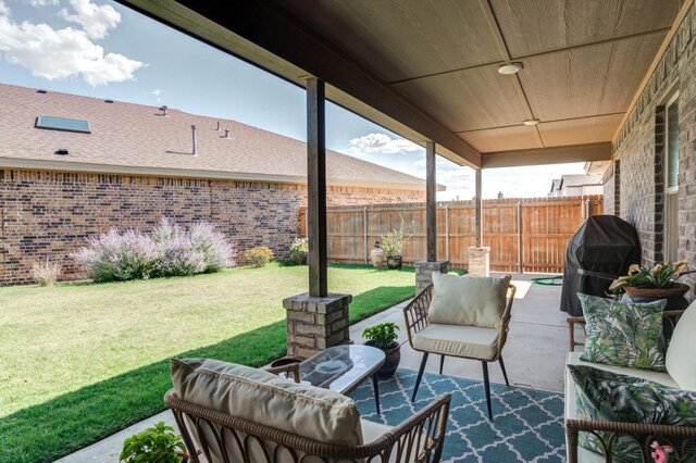 view of patio / terrace featuring outdoor lounge area and a grill