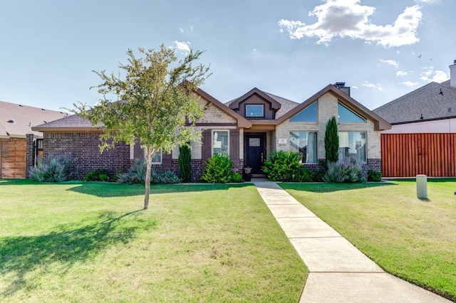 view of front of house featuring a front lawn