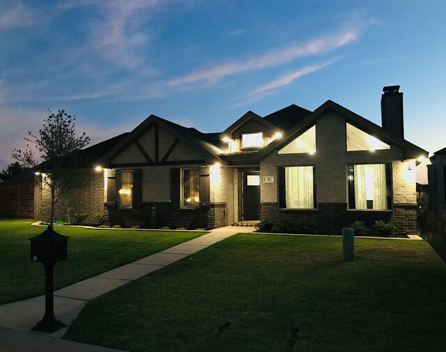 craftsman inspired home featuring a yard