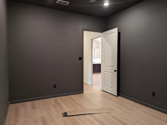 empty room featuring light hardwood / wood-style floors