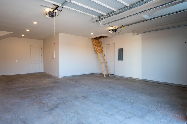 garage featuring a garage door opener and electric panel