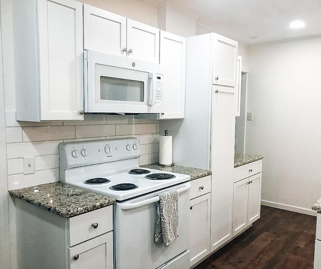 2003 30th St, Lubbock, TX 79411 - kitchen with white appliances, decorative backsplash, stone counters, and recessed lighting