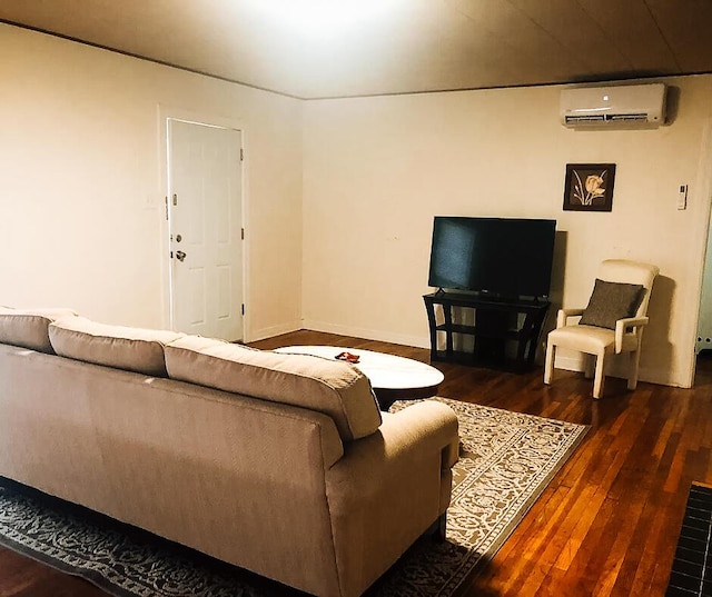 2003 30th St, Lubbock, TX 79411 - living room featuring an AC wall unit and wood-type flooring