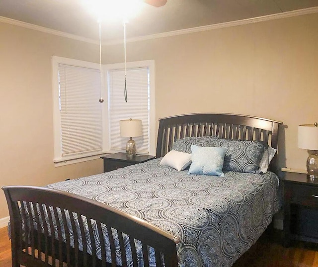 2003 30th St, Lubbock, TX 79411 - bedroom featuring wood finished floors and ornamental molding
