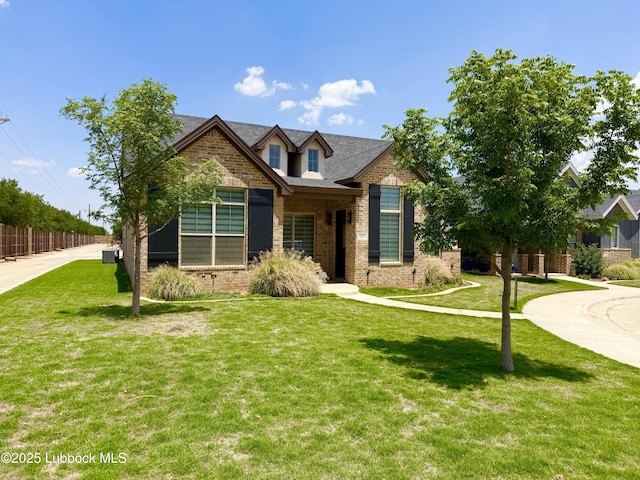 5414 112th St, Lubbock, TX 79424 - view of front of property with brick siding and central air condition unit
