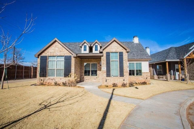 5414 112th St, Lubbock, TX 79424 - view of front of home featuring brick siding