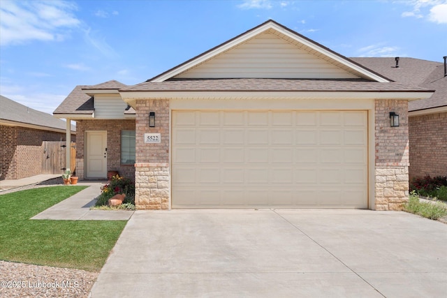 5522 Lehigh St, Lubbock, TX 79416 - view of front of house featuring concrete driveway, a shingled roof, and an attached garage