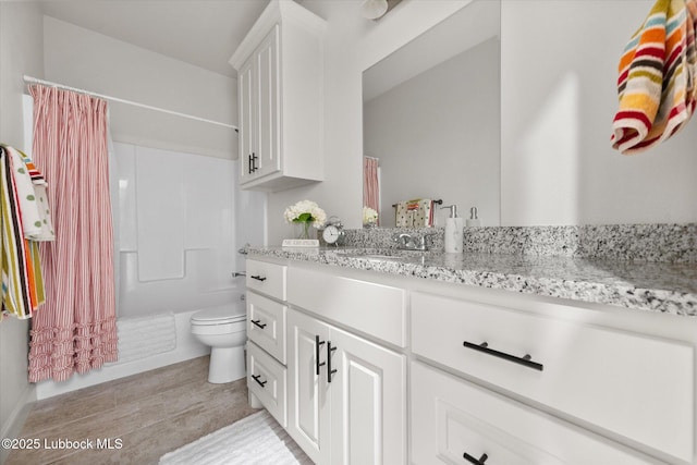 5522 Lehigh St, Lubbock, TX 79416 - full bathroom with vanity, wood finished floors, and shower / bath combo