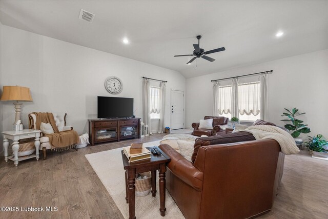 5522 Lehigh St, Lubbock, TX 79416 - living area featuring wood finished floors, a ceiling fan, plenty of natural light, lofted ceiling, and recessed lighting