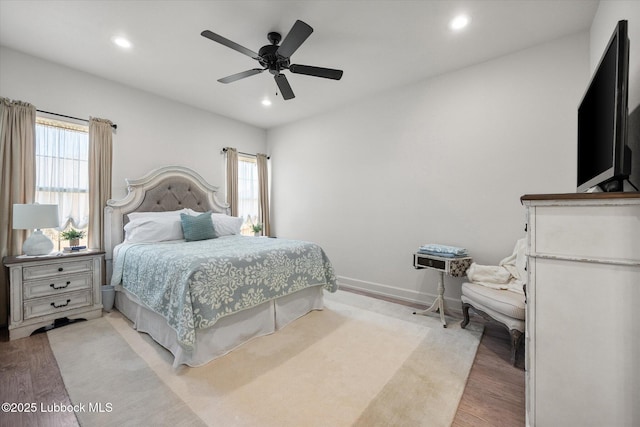 5522 Lehigh St, Lubbock, TX 79416 - bedroom featuring multiple windows, recessed lighting, light wood finished floors, and ceiling fan