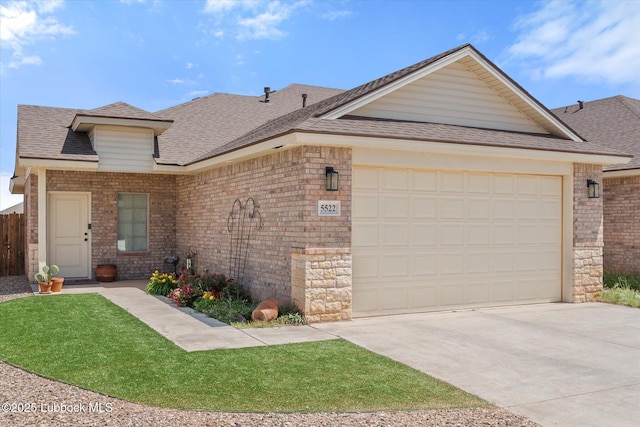 5522 Lehigh St, Lubbock, TX 79416 - view of front of property featuring a garage, a shingled roof, driveway, and brick siding