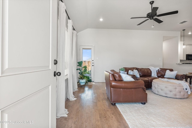 5522 Lehigh St, Lubbock, TX 79416 - living area with light wood-type flooring, a ceiling fan, vaulted ceiling, and recessed lighting