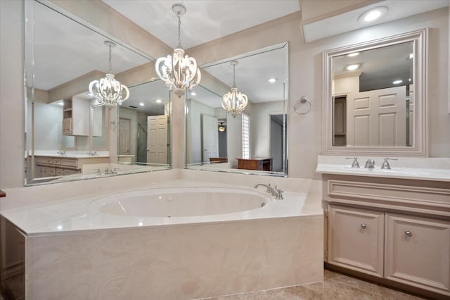 bathroom with vanity, a bath, and tile patterned flooring