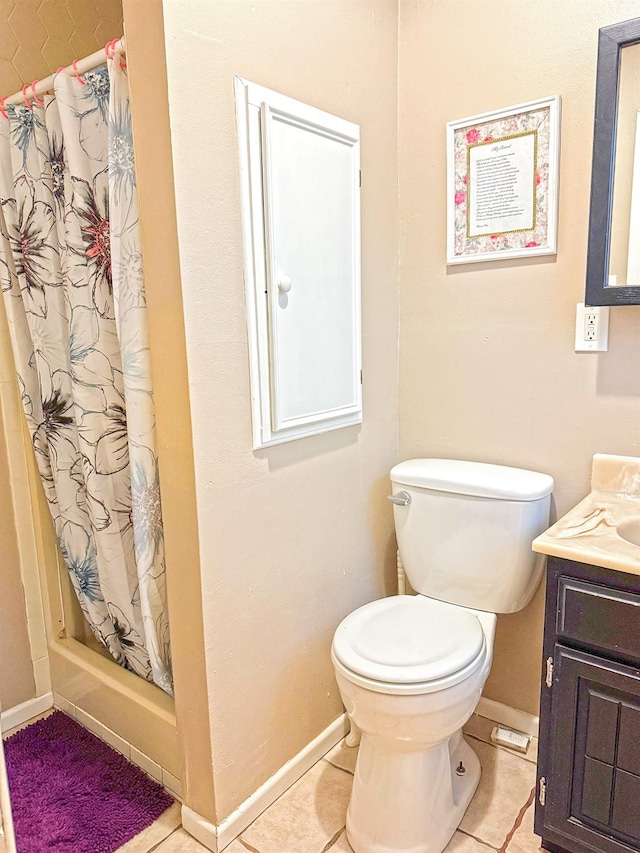 bathroom with vanity, tile patterned flooring, a shower with curtain, and toilet