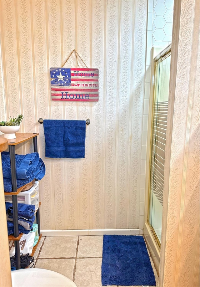 bathroom featuring an enclosed shower