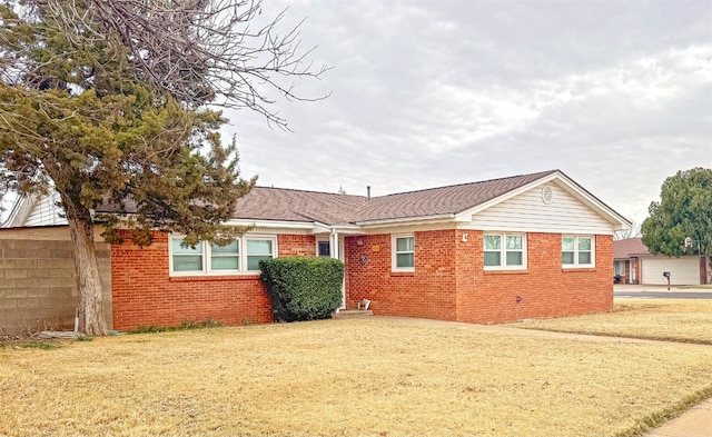 exterior space with a front lawn