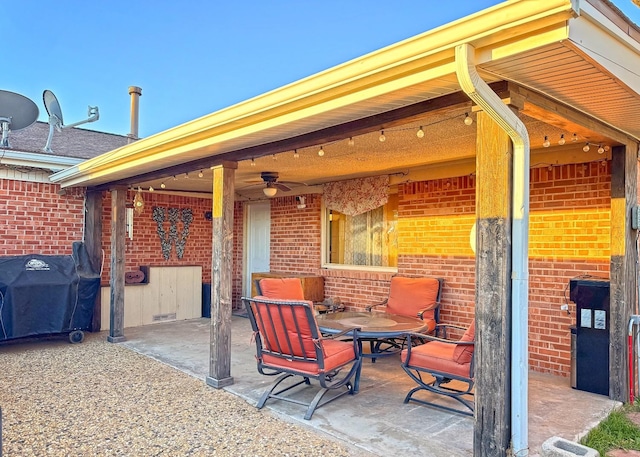 view of patio / terrace featuring ceiling fan and grilling area