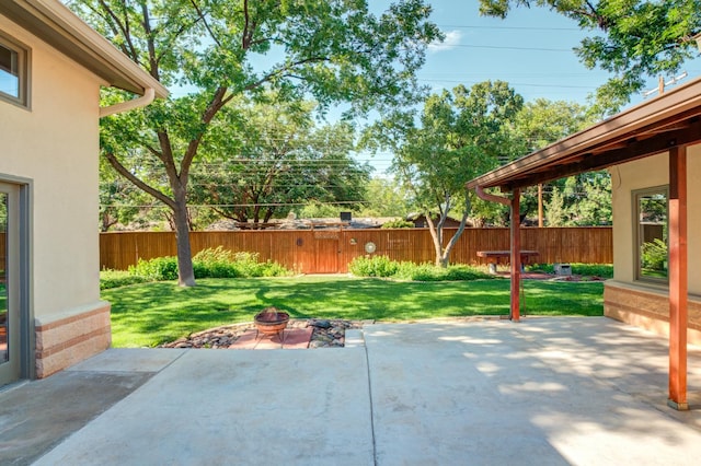 view of patio / terrace featuring a fire pit