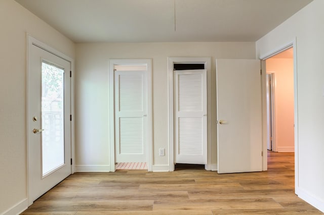 unfurnished bedroom with light hardwood / wood-style flooring