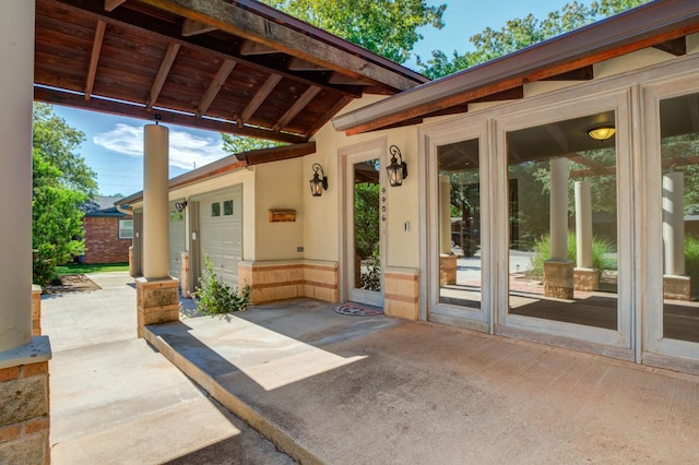 view of patio / terrace with a garage