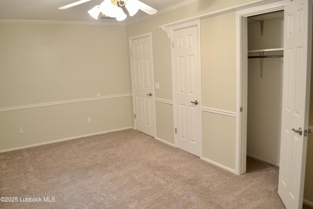 200 Crescent Dr, Littlefield, TX 79339 - unfurnished bedroom with a ceiling fan, a closet, baseboards, carpet flooring, and crown molding