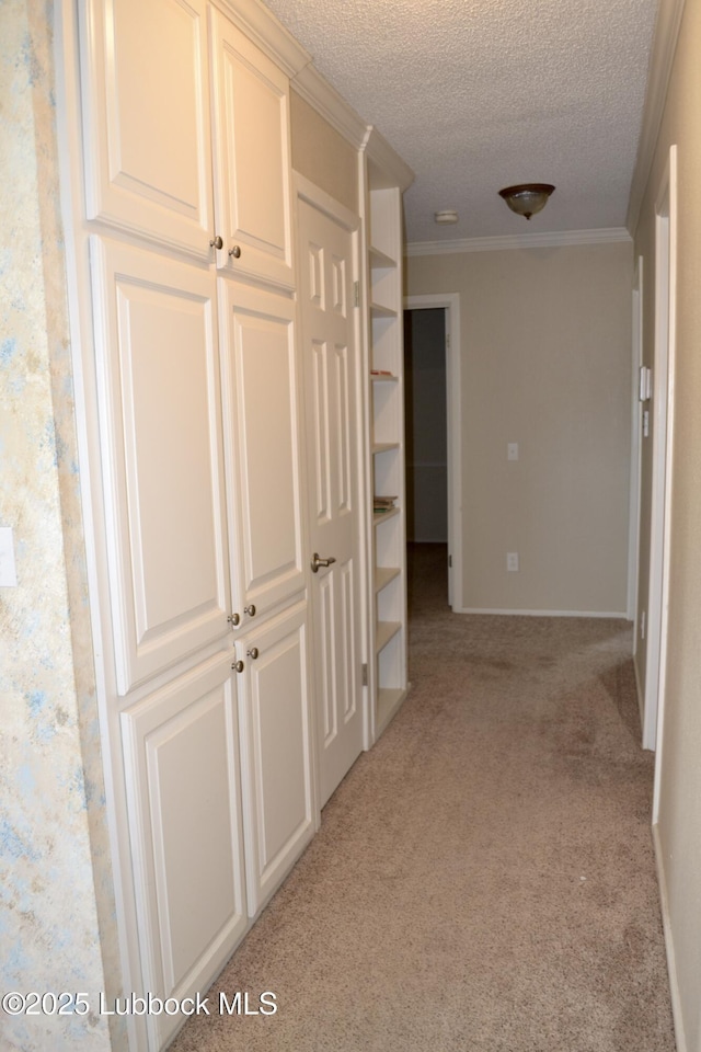 200 Crescent Dr, Littlefield, TX 79339 - corridor with light colored carpet, a textured ceiling, and crown molding