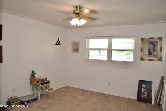 200 Crescent Dr, Littlefield, TX 79339 - interior space with ornamental molding, carpet, baseboards, and a ceiling fan
